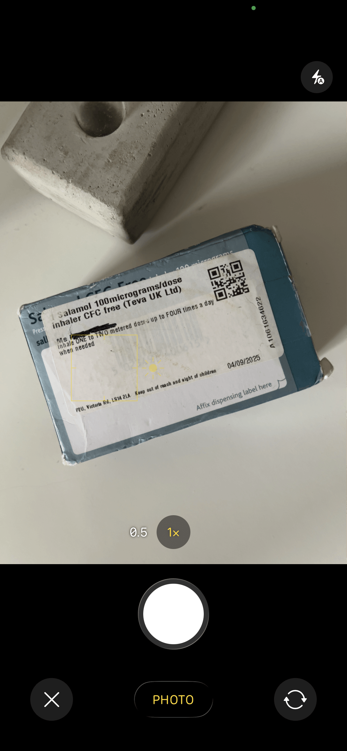 Camera scanning a Salamol inhaler pharmacy label